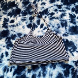Small black and white striped crop top that ties around the neck